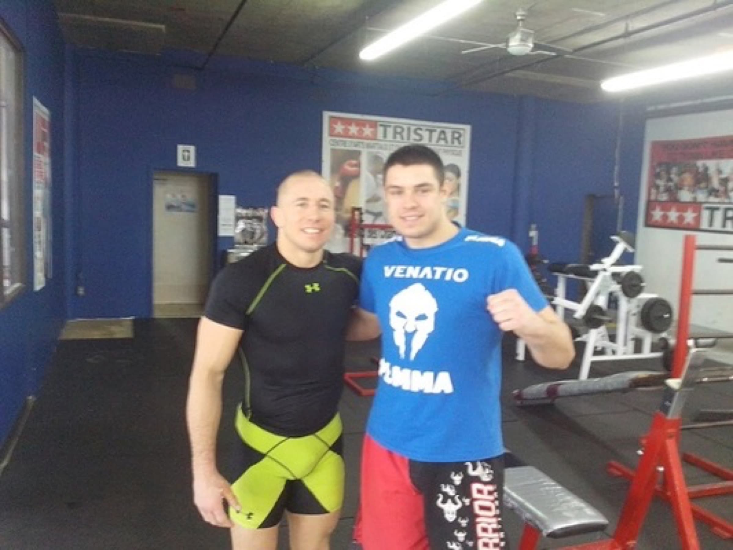 Adam Okniński z Georges'em St-Pierre'em w sali Tristar Gym w Montrealu